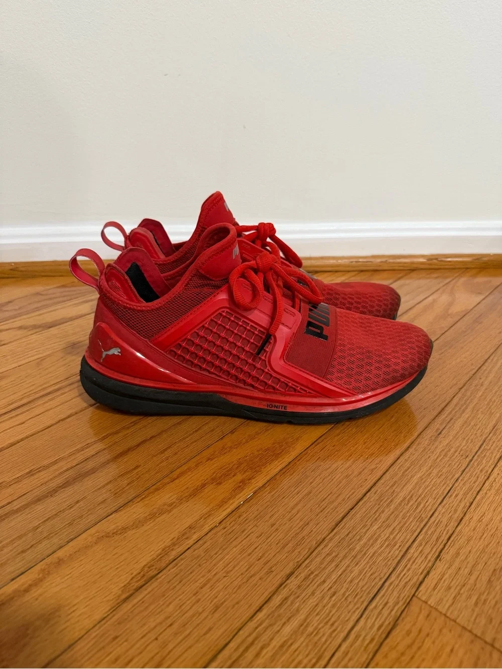 Puma Men's Red Athletic Sneakers with Black Sole